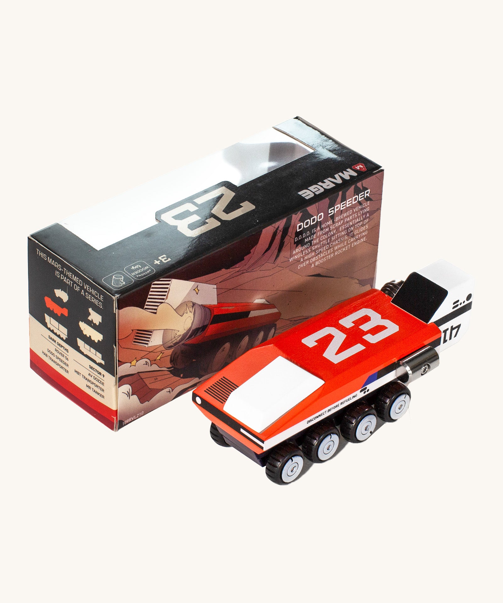 CandyLab red and white DODO M.A.R.G.E Speeder space vehicle next to the original cardboard packaging.