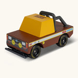 Candylab mud coyote truck. A wooden diecast toy car with a brown body, yellow window, roll cage and retro decals