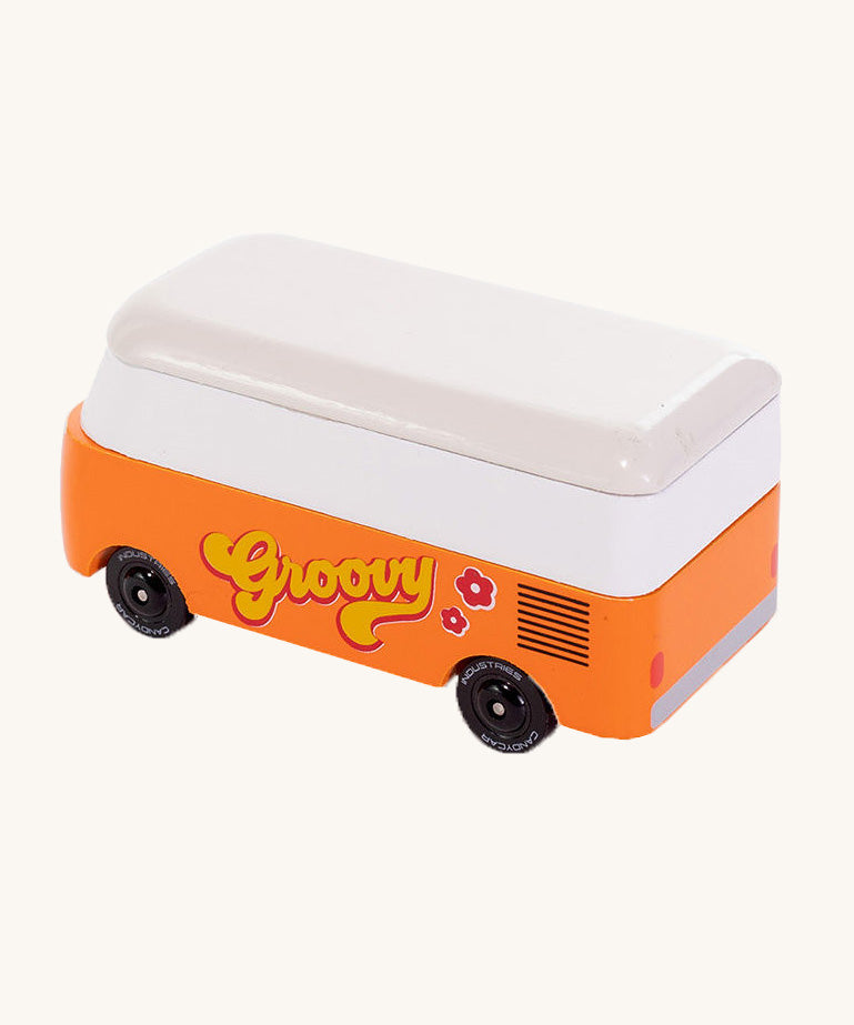 CandyLab orange VW Campervan with 'Groovy' text on the side, in a 60s font - back view.