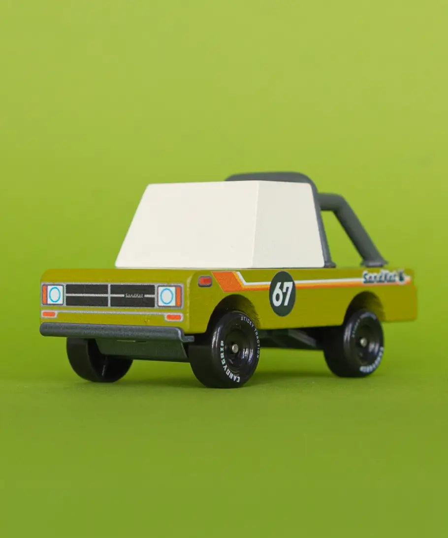 Front of Candylab sand kat adventure truck showing retro decals on the side panel