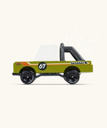 Side of Candylab sand kat adventure truck showing roll cage on the back and  retro decals