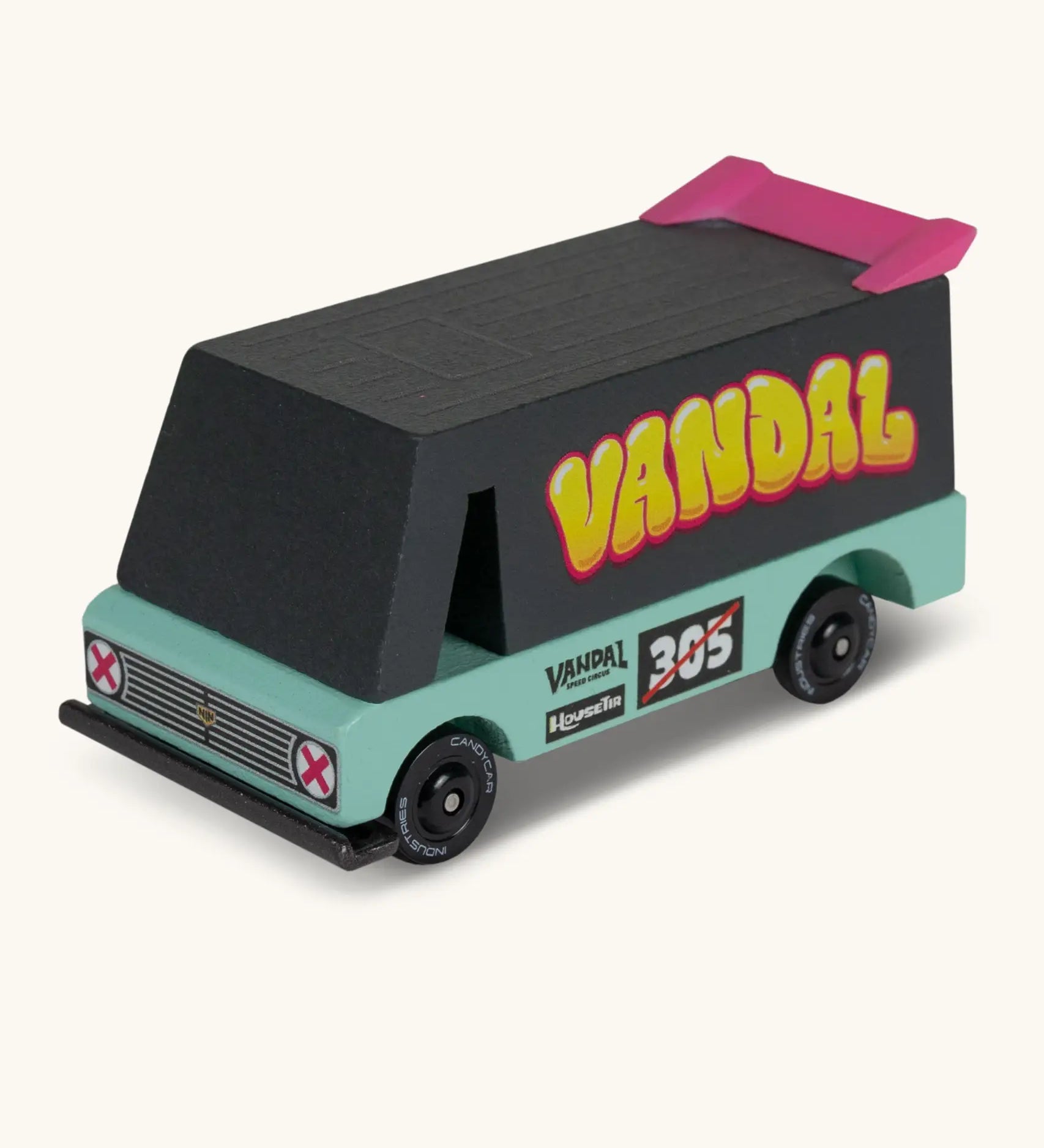 Candylab seafoam vandal van. A wooden diecast toy van in black and aqua with a pink spoiler and retro decals