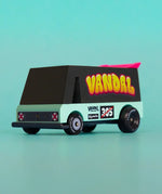 Candylab seafoam vandal van showing black and aqua body with a pink spoiler and retro decals in front of a blue background