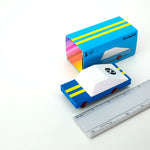 Candylab candycar blue racer 8 toy on a white background next to its box and a metal ruler