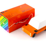 Candylab orange grande mule car toy on a white background next to its box