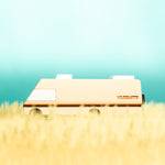 Candylab wooden yosemite rv vehicle toy on a yellow and teal background
