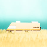 Candylab wooden yosemite rv vehicle toy on a yellow and teal background