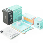 Pieces of the Candylab collectable wooden beach tower diecast model on a white background next to the teal box