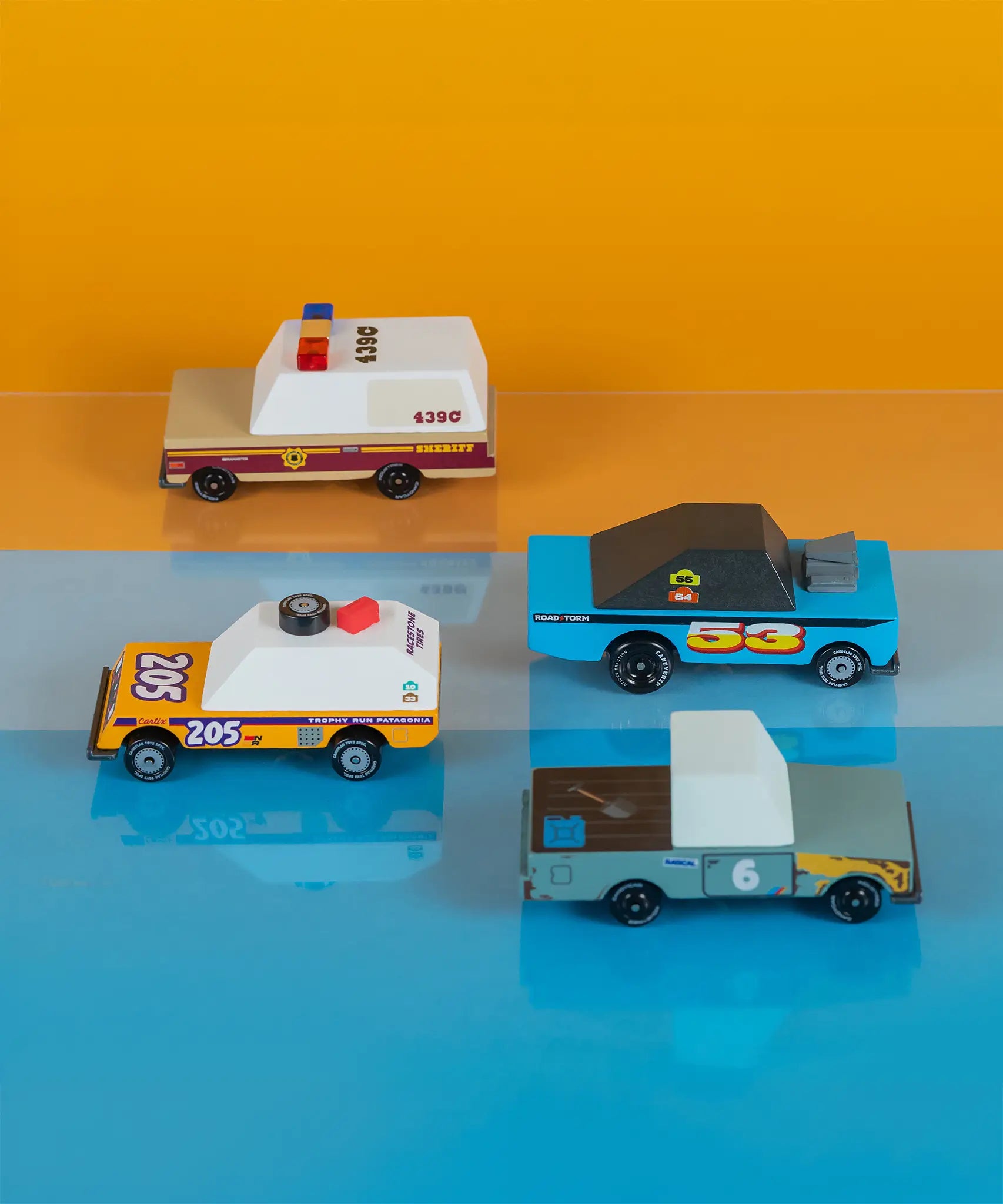 Candylab rust patrol toon cars 4 pack lined back to back on a colourful background