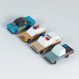 4 wooden diecast sturdy Candylab toon cars from the rust patrol set lined up on an angle