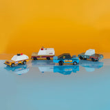 4 wooden diecast sturdy Candylab toon cars from the rust patrol set in front of a coloured background