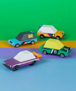 4 Candylab Tokyo heat toon wooden diecast racing toy cars parked against a coloured background