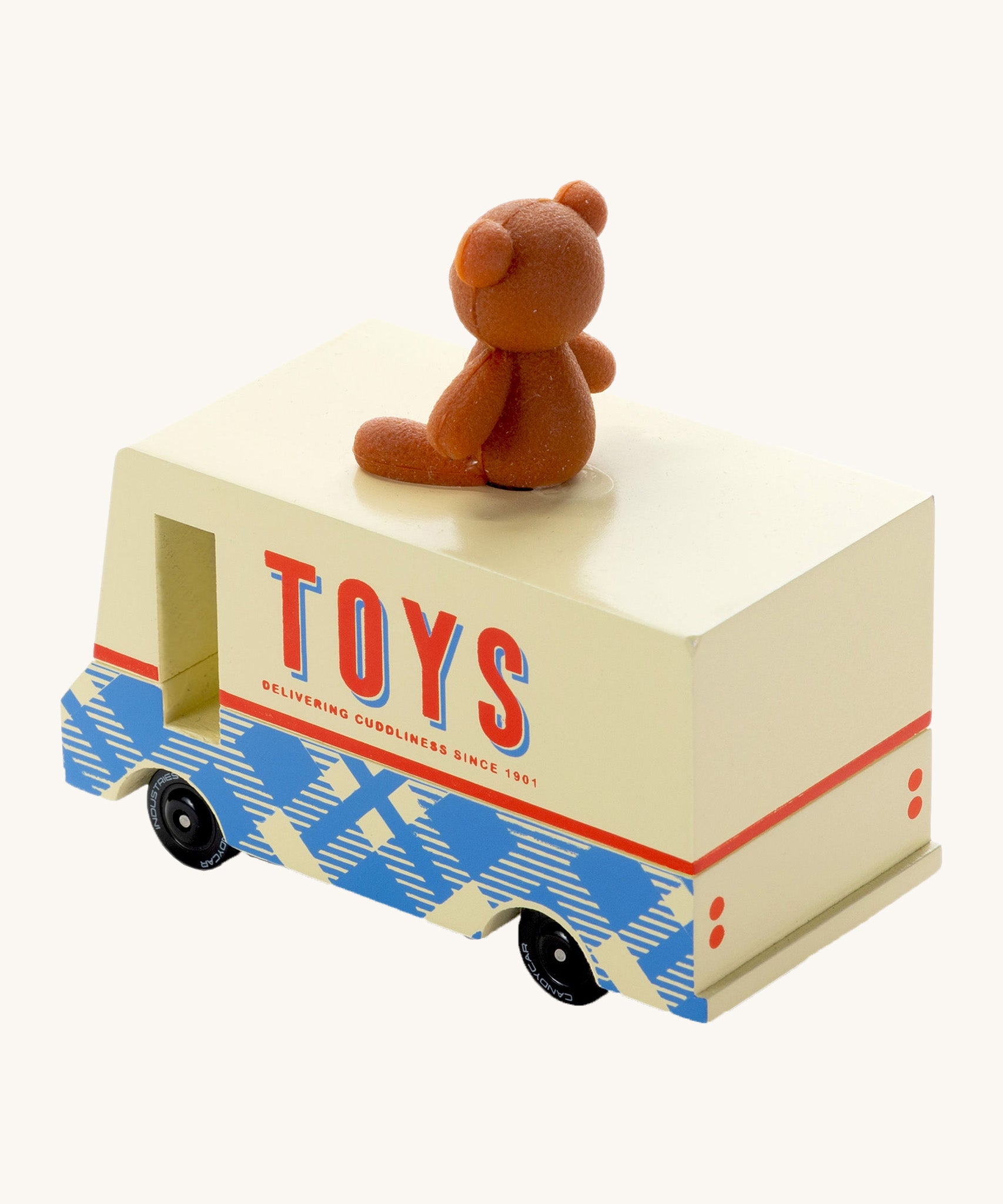 CandyLab cream and blue CandyVan with a brown teddy bear on the roof with Toys text logo in red on the side - back detail view.