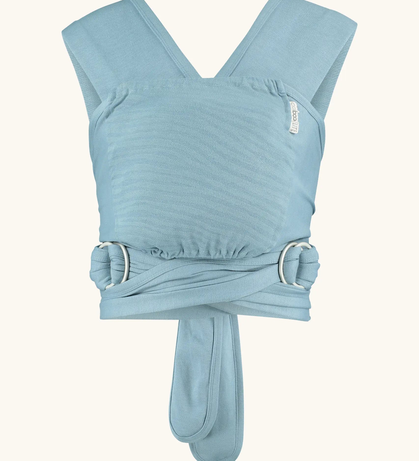 Close Caboo Lite Baby Carrier in Denim front view, showing wide shoulder straps, ring adjustment, and soft front panel.