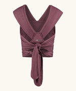 Close Caboo cotton blend Baby Carrier in burgundy back view, showing wide shoulder straps and tie waist adjustment strap