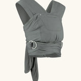 Close Caboo Organic Baby Carrier in olive side view, showing wide shoulder straps, ring adjustment, and soft front panel.