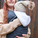 Mother carrying a baby in Close Caboo cotton blend soft structure Baby Carrier in phantom 