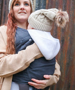 Mother carrying a baby in Close Caboo cotton blend soft structure Baby Carrier in phantom 