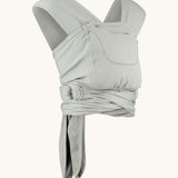 Close Caboo Organic Baby Carrier in porpoise side view, showing wide shoulder straps, ring adjustment, and soft front panel.