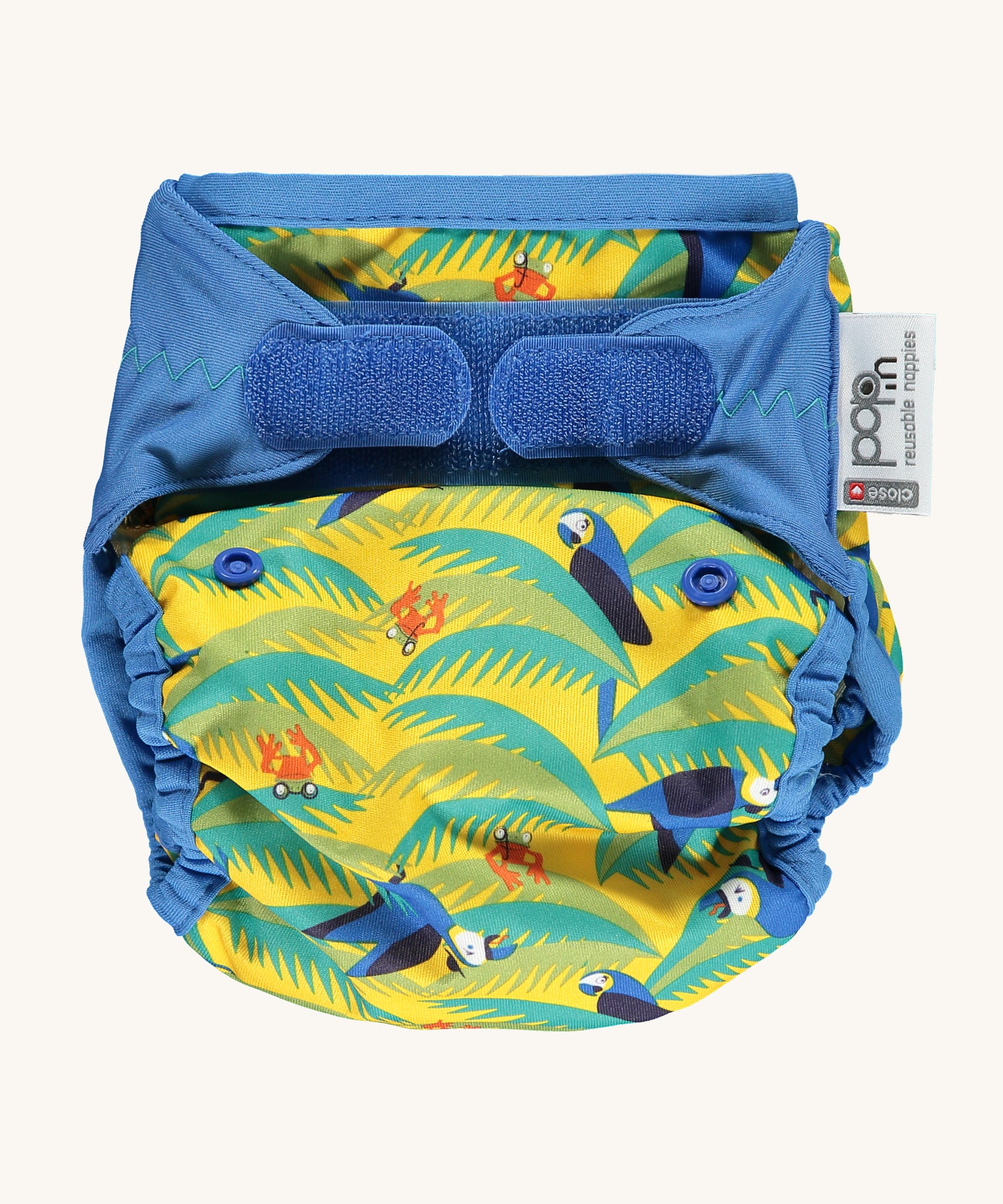 The Close Parent Pop-in reusable nappy wrap cover with velcro closures, in a parrot print.