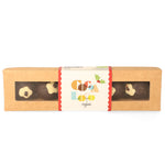 Box of Cocoa Loco fairtrade organic dark chocolate Christmas pudding truffles on a white background
