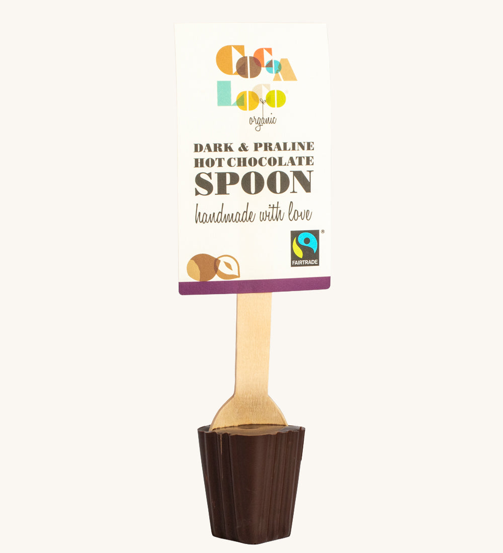 Cocoa Loco Dark Praline Hot Chocolate Spoon. 30g of UPF free, organic, Fairtrade dark praline chocolate on a wooden spoon.