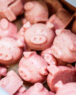 Cocoa Loco Organic Fairtrade Raspberry Chocolate Pigs sweets together