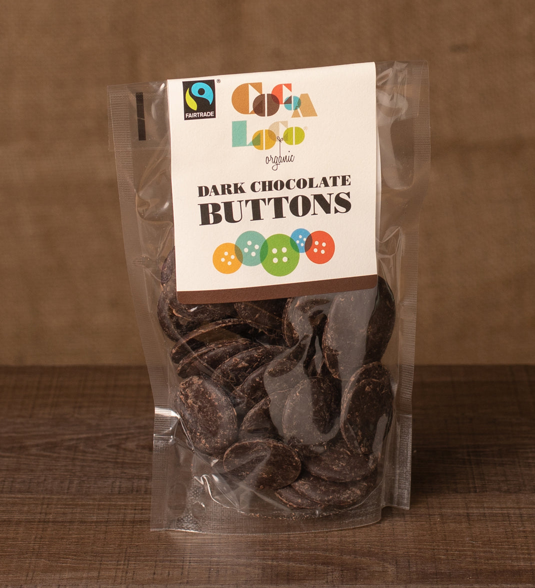 Cocoa Loco Dark Chocolate Buttons in a 100g pack. These chocolate buttons are organic, Fairtrade and free from UPF. 