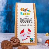 A pack of Cocoa Milk Chocolate Santas. These Chrimas Santa shaped santas are made with UPF free, organic and Fairtrade chocolates. 