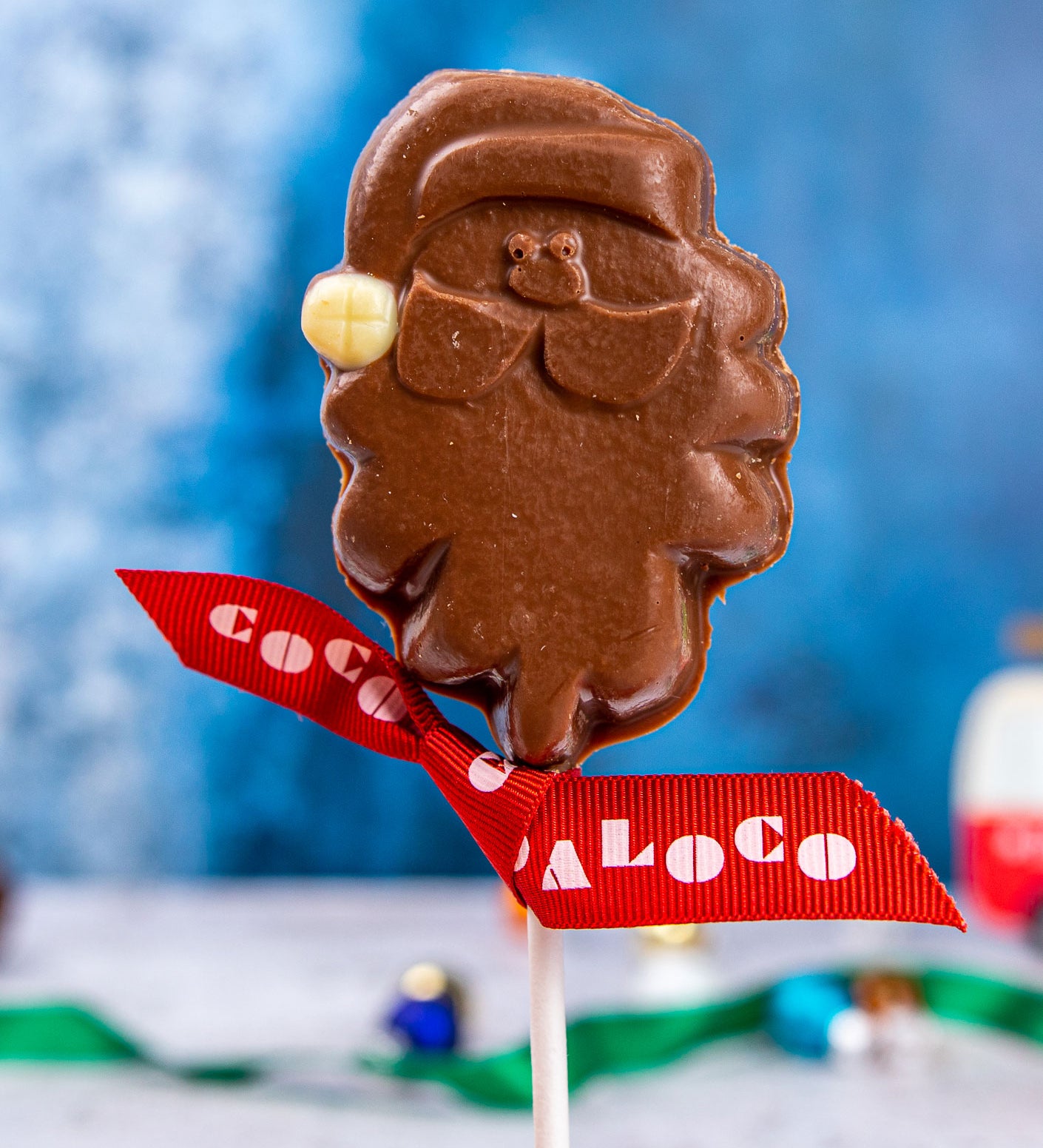 A Cocoa Loco Milk Chocolate Santa Lolly. These milk chocolate Christmas lollies are free from UPF ingredients. 
