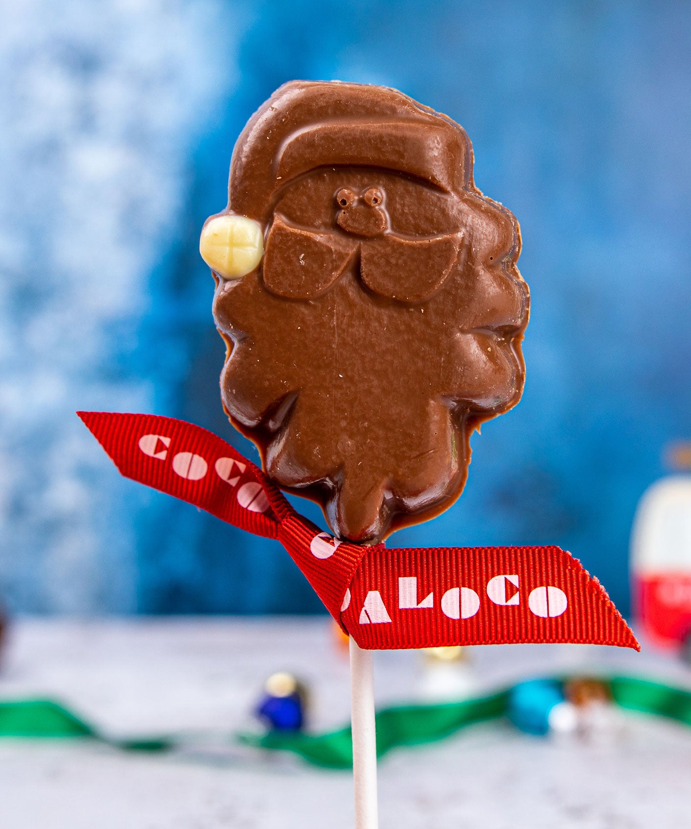 A Cocoa Loco Milk Chocolate Santa Lolly. These milk chocolate Christmas lollies are free from UPF ingredients. 
