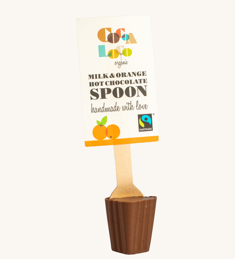 Cocoa Loco Milk and Orange Hot Chocolate Spoon. 30g of UPF free, organic, Fairtrade chocolate orange chocolate on a wooden spoon.