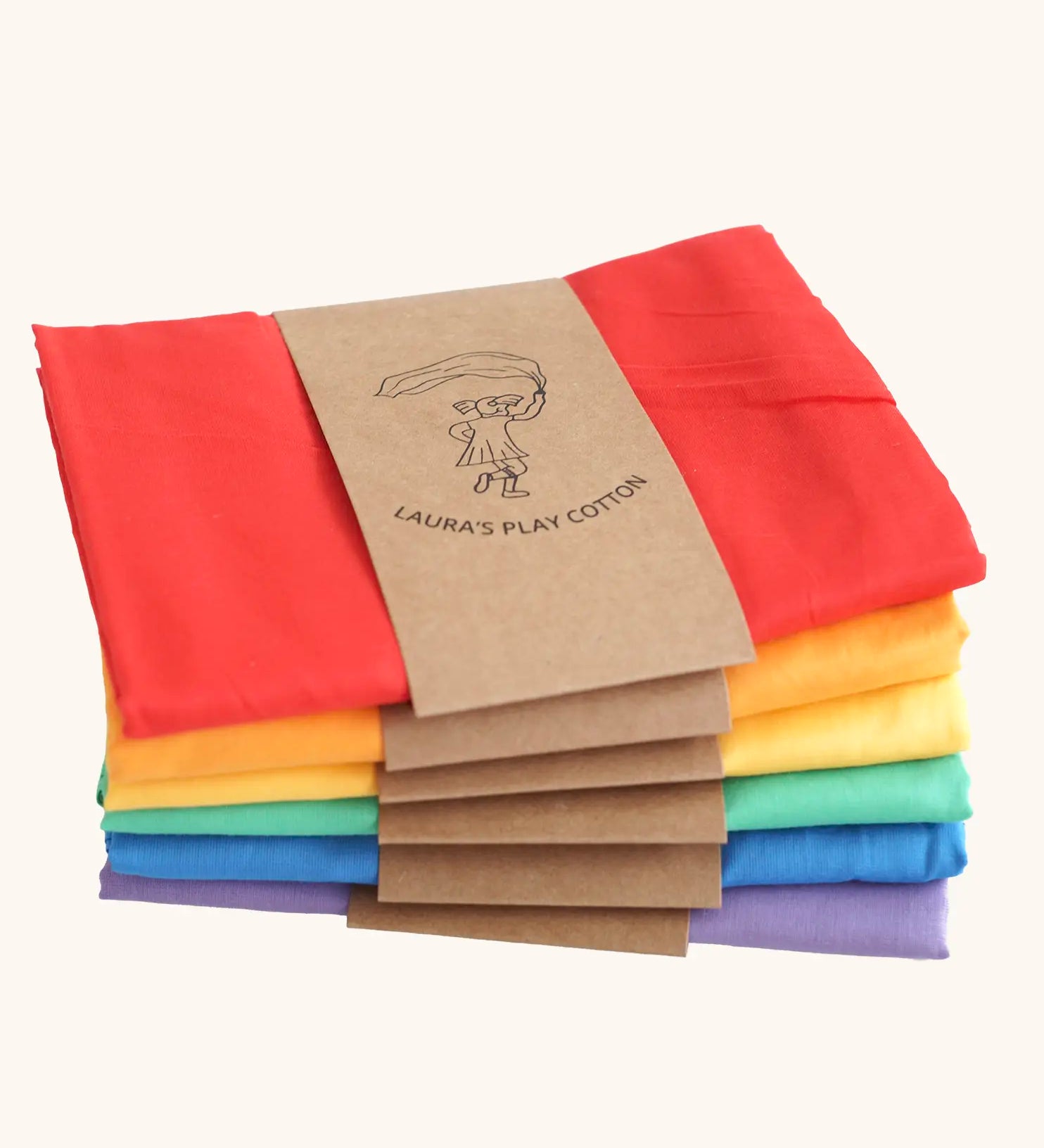 Six organic cotton play cloths by Laura's Play Cotton, in solid colours folded and stacked in rainbow order.