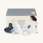 The Lola & Lykke Complete Breast Pump Spare Parts, in front of their box