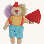 Olli Ella Holdie Folk Confetti The Clown. A fun clown figure with purple and blonde hair, a little red hat, a yellow top with white spots and light blue shorts, with a red fabric megaphone, on a cream background