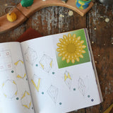 Crafting Magical Window Stars tutorial book written by Frédérique Guéret. View of one of the how to guides inside. 