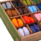 Close up of the natural soy wax Crayon Rocks in their cardboard box on a white background