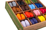 Close up of the natural soy wax Crayon Rocks in their cardboard box on a white background