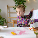 Child sat at a table