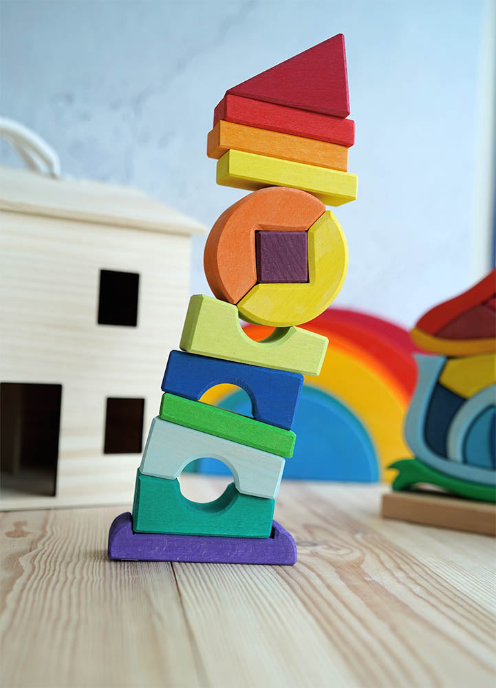 The Glückskäfer Crooked Tower on a shelf in a playroom. 