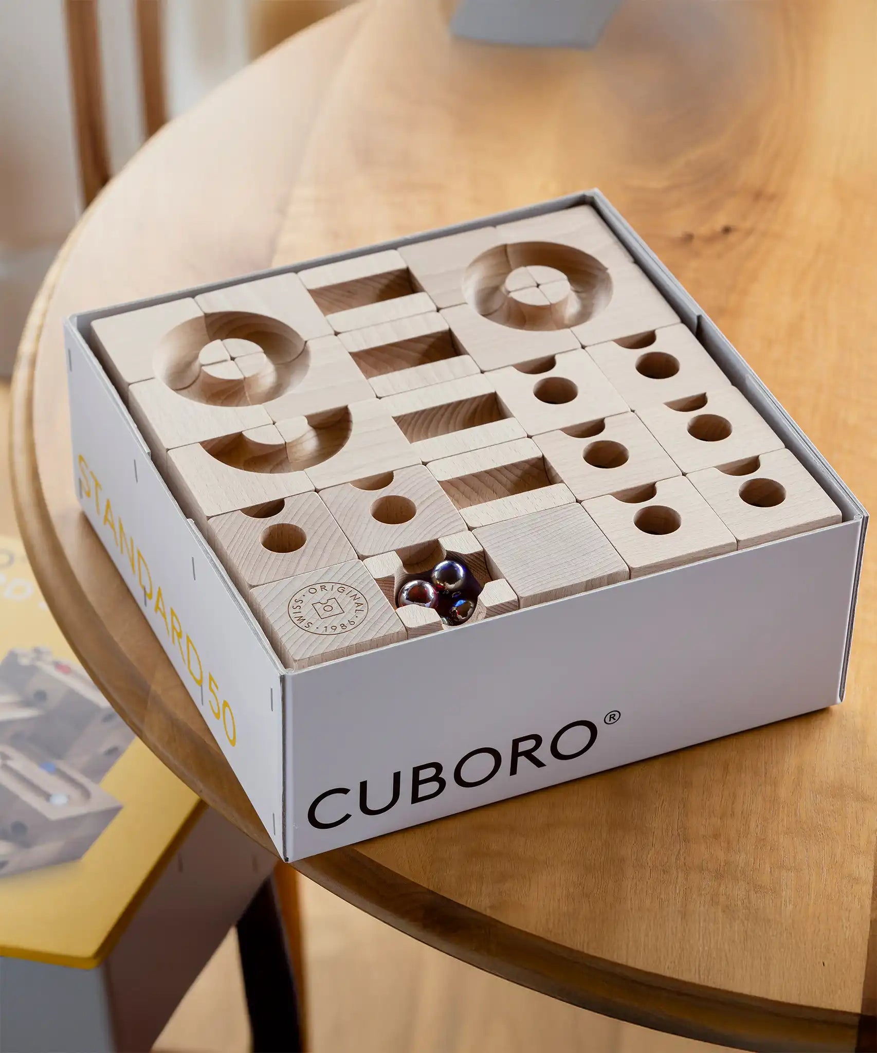 Cuboro standard 50 piece wooden marble run set in it's packaging box.