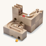 Cuboro kids plastic-free wooden Duo marble run set stacked on a cream background