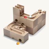 Cuboro kids plastic-free wooden Duo marble run set stacked on a cream background