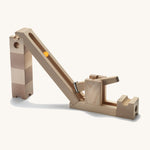 Cuboro childrens wooden marble run kick accessory toy set stacked on a cream background