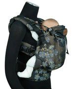 Side of Didymos didyfix carrier in blue blossom shown on mannequin. A soft structured full buckle carrier made from cotton