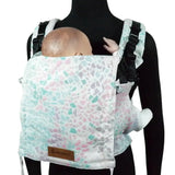 Front of Didymos didyfix carrier in summer mosaic shown on mannequin. A soft structured full buckle carrier made from cotton