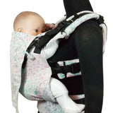 Side of Didymos didyfix carrier in summer mosaic shown on mannequin. A soft structured full buckle carrier made from cotton