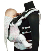 Side of Didymos didyfix carrier in summer mosaic shown on mannequin. A soft structured full buckle carrier made from cotton