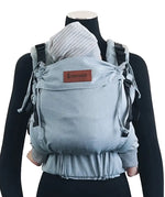 Front of Didymos didyfix carrier in blue ocean shown on mannequin. A soft structured full buckle carrier made from cotton