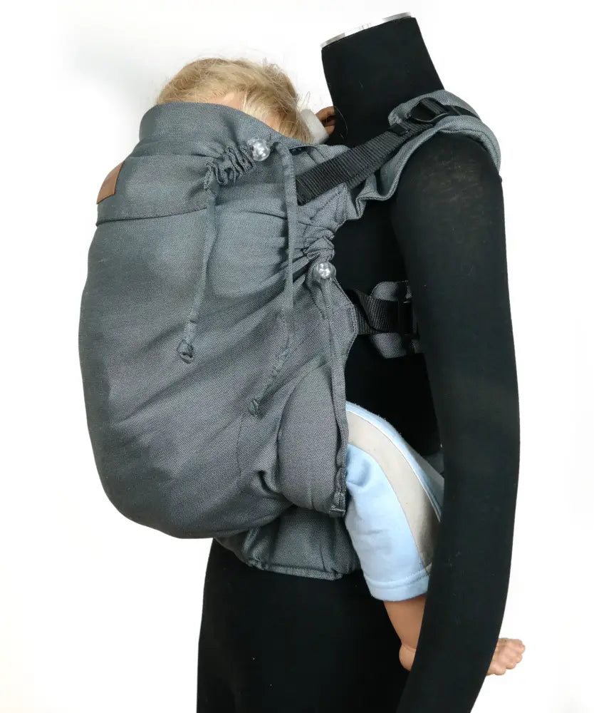 Double anthracite Didymos didyfix toddler carrier shown on mannequin showing neck rest adjusted to toddler's head